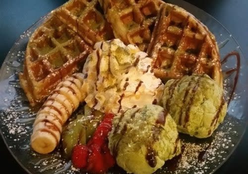 waffle with fruit and whipped cream