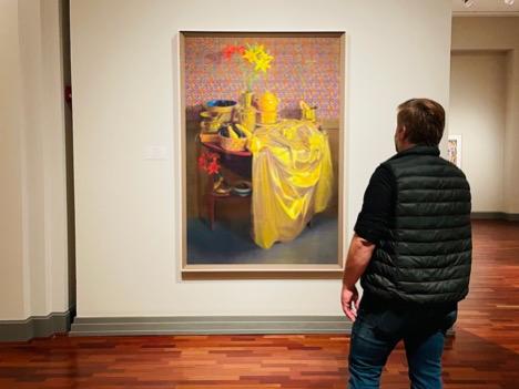 Man looking at art at Museum of Art