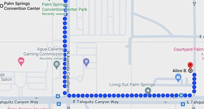 A screenshot of a map showing a route with blue dots leading from the Palm Springs Convention Center to a destination marked as "Alice B." on E Tahquitz Canyon Way. Nearby landmarks include the Aqua Caliente Gaming Commission and Living Out Palm Springs, with parking indicated by a 'P' symbol.
