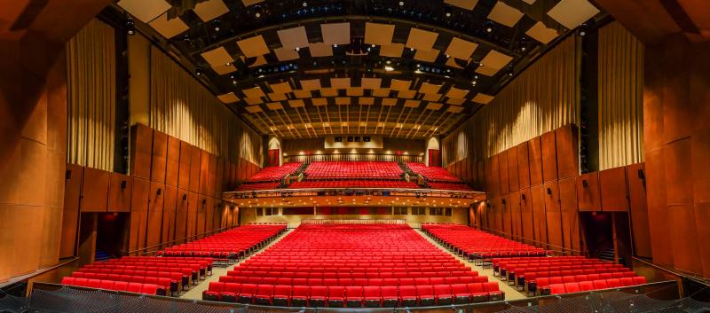 A photo taken from the stage at Popejoy Hall showcasing all of the seats.