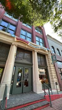 A picturesque photo capturing the facade of the Main Street Children's Museum in Rock Hill, South Carolina. The building's charming and colorful exterior features playful architectural details that reflect the spirit of childhood and creativity, welcoming visitors to a world of educational and interactive experiences for kids