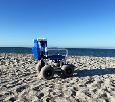 Side view of a beach wheelchair on Englewood Beach, Florida.