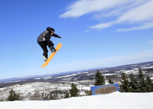 Snowboarding jumping at Blue Mountain Resort