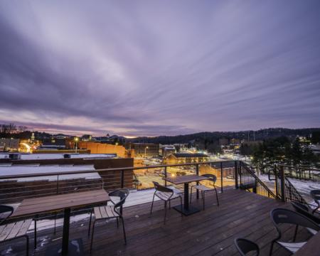 A cloudy sky is above downtown Boone from the Horton Hotel's rooftop.