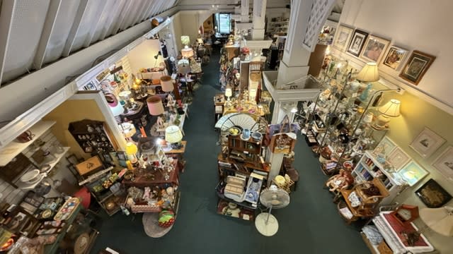 A second story view of a thrift and antique shop located in downtown Cumberland, MD.
