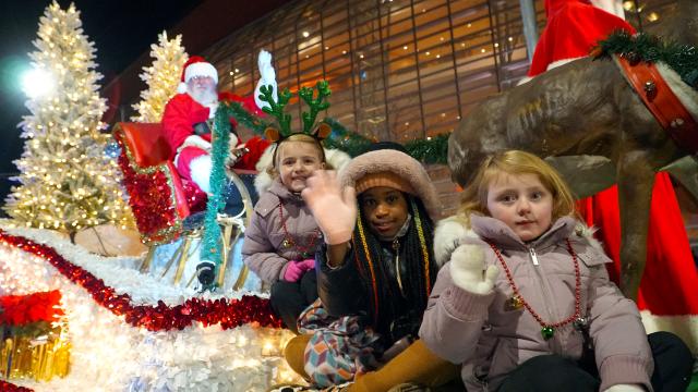 Children on a parade float with Santa during the Dayton Holiday Festival Children's Parade