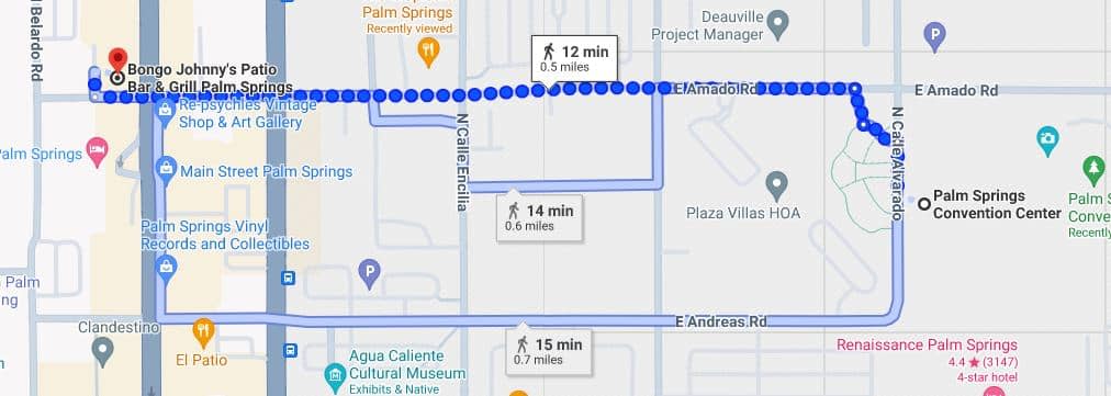 Alt text: Screenshot of a digital map showing a walking route from Bongo Johnny's Patio Bar & Grill in Palm Springs to the Renaissance Palm Springs hotel. The route is highlighted with a dotted line, and estimated walking times and distances are marked. Various points of interest and streets are visible along the route.