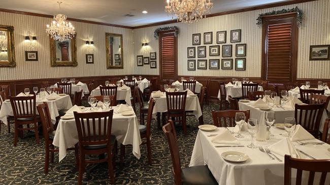 Formal dining room with whote tablecloths