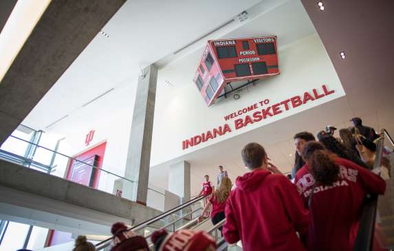 People riding the escalator to the second floor of Assembly Hall