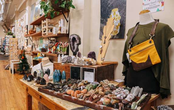 A display of clothing, gemstones, art, and more at Gather