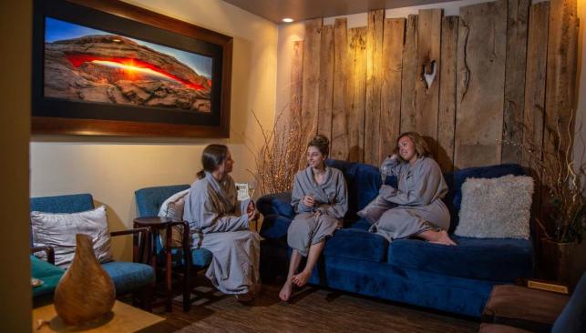 Three customers in robes relaxing in Natural Elements Spa