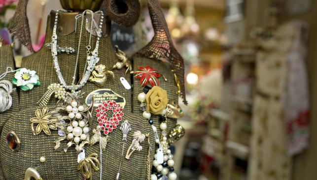 Mannequin covered in fashion pins