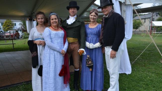 Attendees of 2022’s A Midsummer Night’s Ball in period clothing