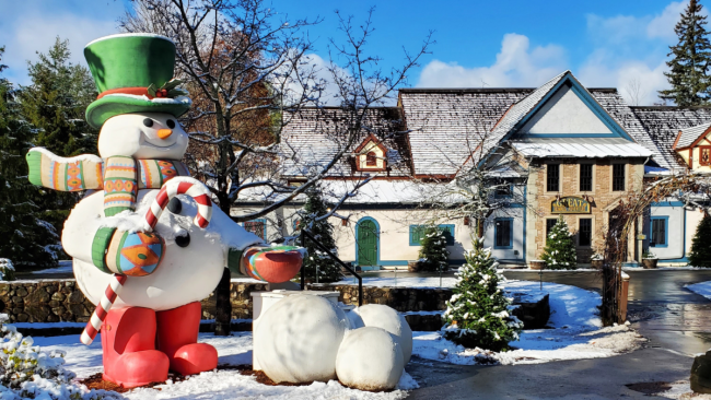 Christmastime at Santa's Village (Snowman and Picturesque Village Backdrop with Dusting of Snow)