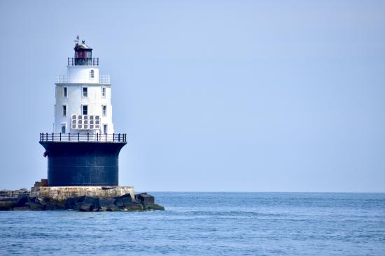 A view of the Harbor of Refuge Lighthouse as it sits on the Atlantic Ocean.
