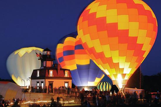 Balloons at night during Saratoga Balloon & BBQ Festival