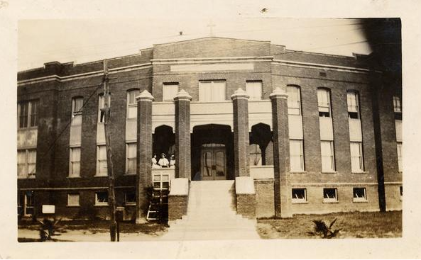 black and white photo of the multi story st. charles academy