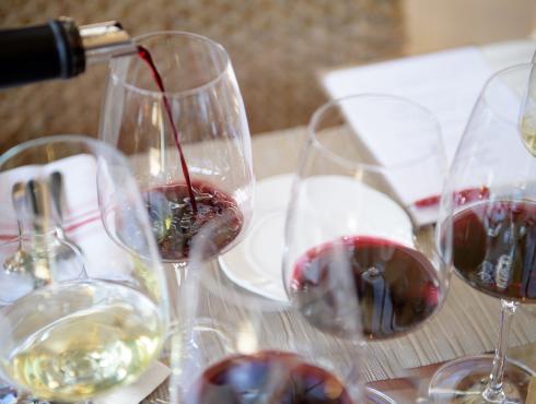 pouring wine in glasses