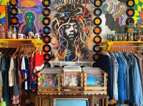 Racks of clothes and records at Odd Shop