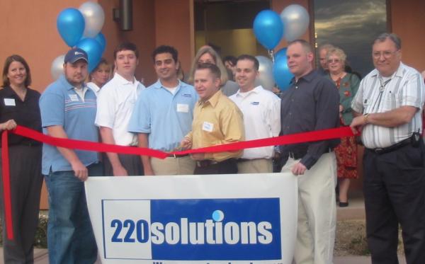 220 Solutions Ribbon Cutting