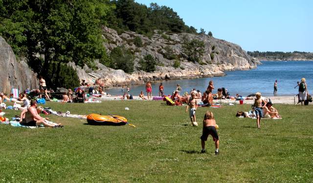 People enjoying a sunny day at the beach