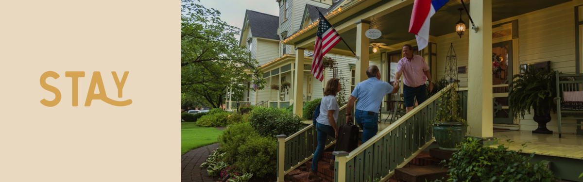 A couple of people walk into a charming inn for their fall getaway in Rutherford County, NC.