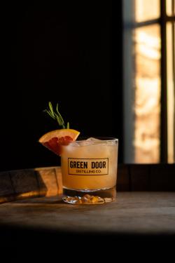 Green Door distilling rosemary greyhound