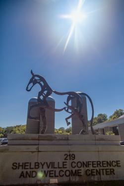 A photo of a Saddlebred horse statue in front of the Shelbyville Conference Center.