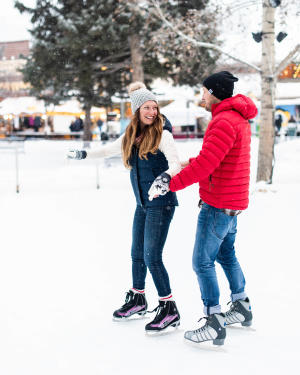 Two skating in Town Square
