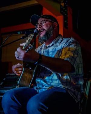 Man playing the guitar