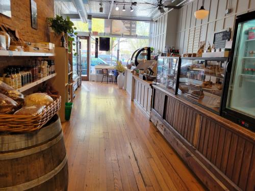 The bakery counter at Table Mesa, vintage style lighting and hardwood floor.