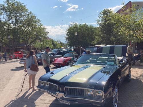 Couple looking at the classic cars at Touch a Truck