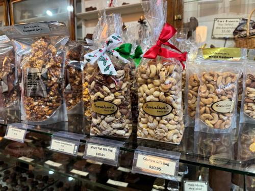 nuts in bags with Christmas ribbon on them at Beerntsen's