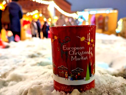 Photo of decorative mug in the snow at European Christmas Market in St. Paul.