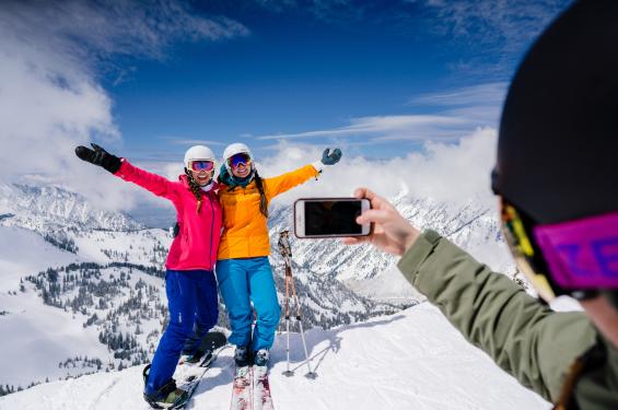 Friends at Snowbird taking a ski photo