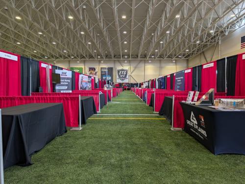 Expo set-up in Fieldhouse at M Health Fairview Sports Center