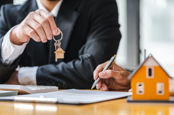 Realtor handing over keys