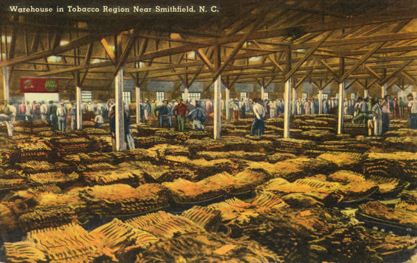 Colorized postcard of typical tobacco-auction scene in the 1930s in Smithfield, NC.