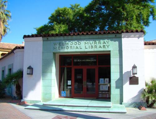 Front view of the Welwood Murray Memorial Library with its main entrance and sign visible.