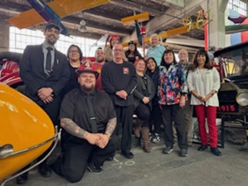 The ACE class from December 2024 pose for a picture.