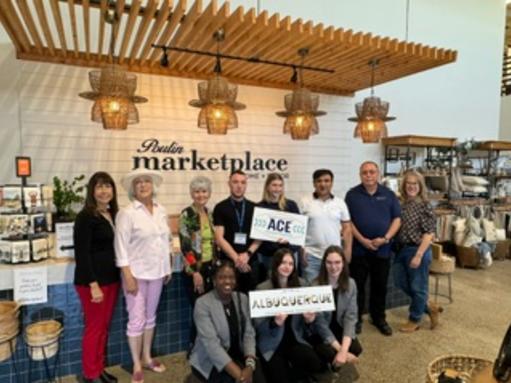 ACE graduates pose at Poulin Marketplace