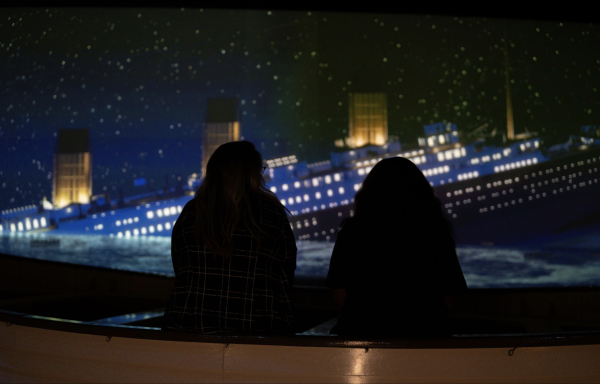Two people watching titanic sink