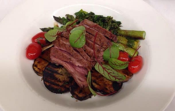 local veggies and steak on plate