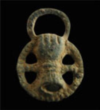 Fatima Charm that was excavated at the maynard-Burgess House.