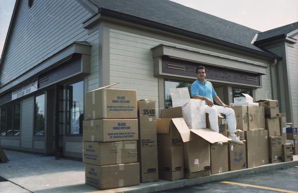 Cameron Mitchell in front of his first concept