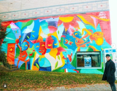 ITOPA mural and artist Benji Nova