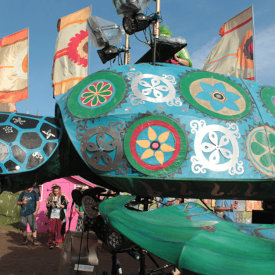 A large model of a turtle which plays music at Glastonbury.