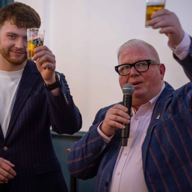 Paul and Harry Askew raising a toast at the opening of their new restraunt and bar 'Barnacle'