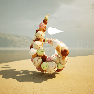 A 6 icon made from ice cream on a beach with a family walking