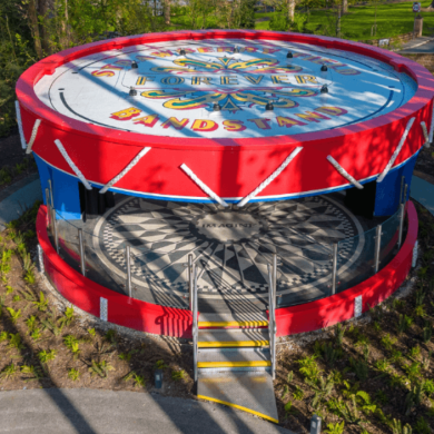 A large band stand in the shape of a drum at Strawberry Field.